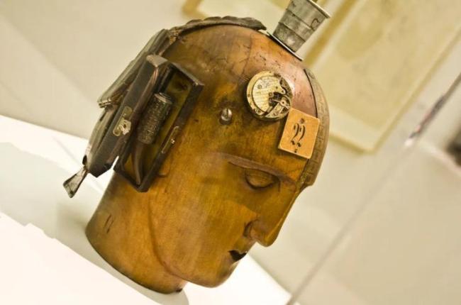 A wooden human head.