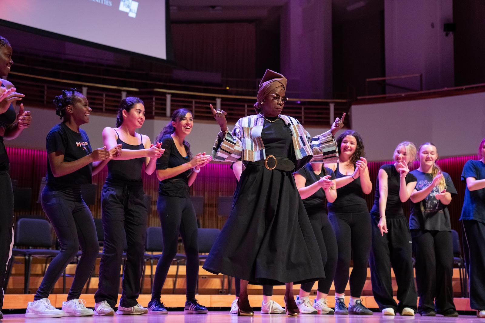 Angélique Kidjo dances on stage with students